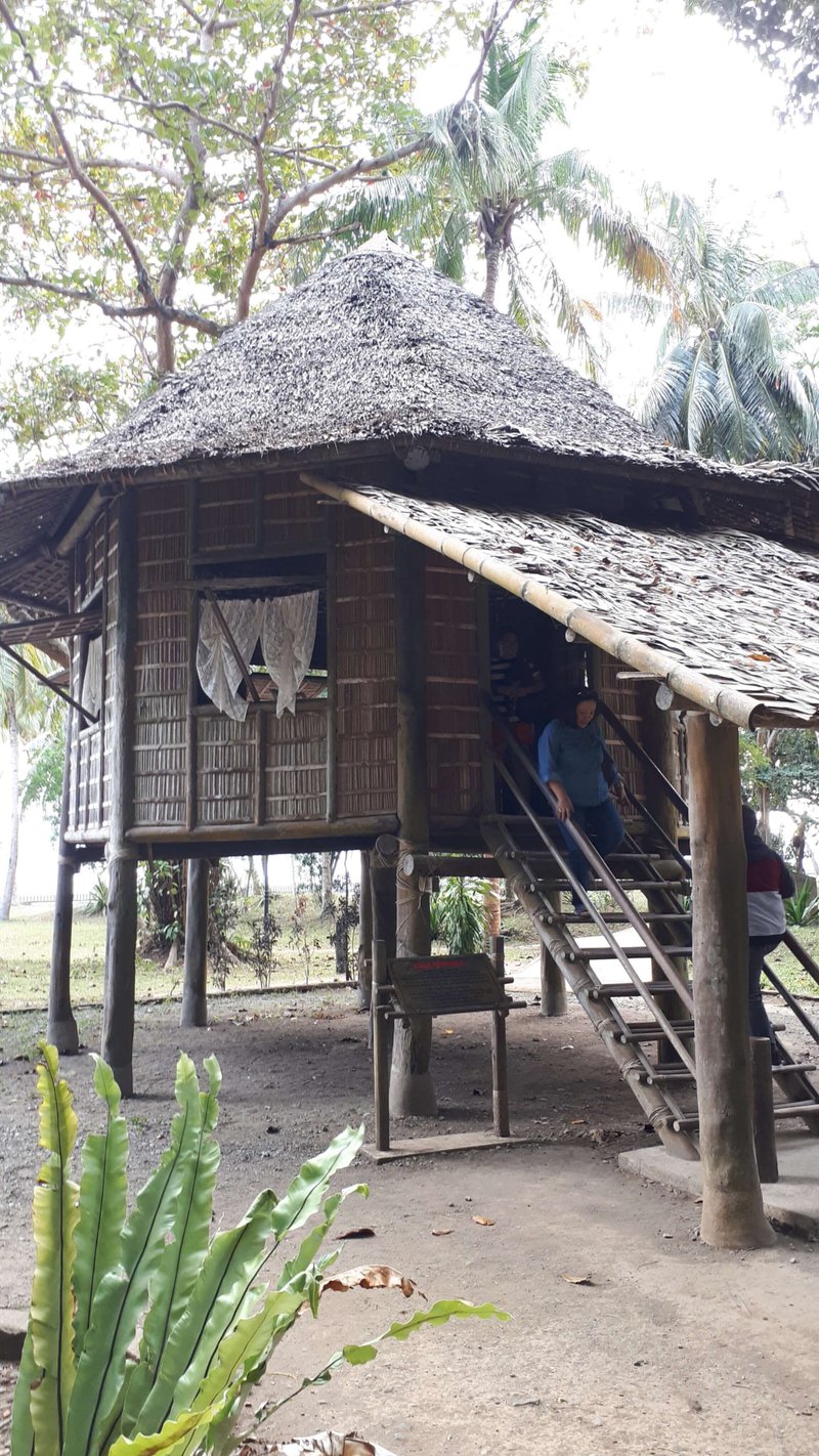 a raised nipa hut, octagonal in shape