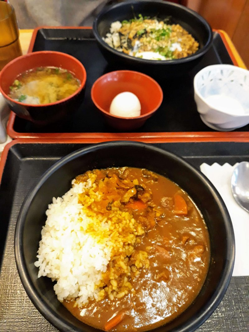 Bowls of rice and curry with miso soup